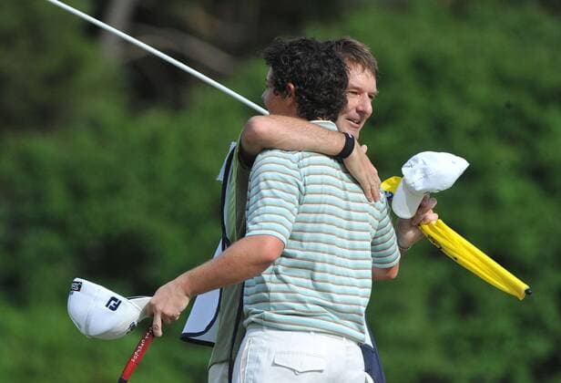 Rory McIlroy (Northern Ireland) hugs his caddie J.P. Fitzgerald after winning the Quail Hollow Tournament in Charlotte, North Carolina on May 2, 2010. McIlroy won the Quail Hollow 15-under-par for a combined score of 273.  CHA20100502347 o0 Mc Illroy, Nordirland, Jubel, Freude, Sieg, Sieger,