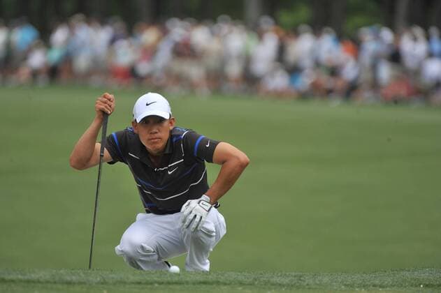 Anthony Kim (USA) lines up a shot on the 1st green during the fourth round of the Quail Hollow Tournament in Charlotte, North Carolina on May 2, 2010.  CHA20100502305