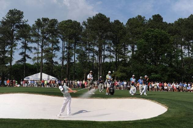 Rory McIlroy (Northern Ireland) hits out of a bunker on the 16th fairway during the final round of the Quail Hollow Tournament in Charlotte, North Carolina on May 2, 2010. McIlroy won the Quail Hollow 15-under-par for a combined score of 273.  CHA20100502342 o0 Mc Illroy, Nordirland, Bunkerspiel