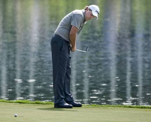 Phil Mickelson (USA) reacts to a missed birdie putt on the 17th green during the first round of The Players Championship PGA golf tournament in Ponte Vedra Beach, Florida on May 6, 2010.  PVB2010050604