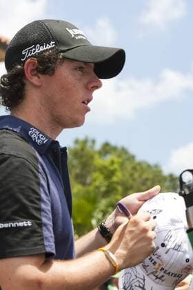 Rory McIlroy, froimn Lougherne, Northern Ireland, signs autographs after finishing at one over par on the second round of The Players Championship PGA golf tournament in Ponte Vedra Beach, Florida May 7, 2010.  PVB2010050722 o0 Mc Ilroy