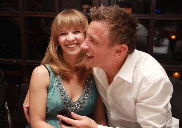 Ivica Olic of FC Bayern Muenchen and his wife Natalie laugh during a dinner to celebrate their German Championship title on May 8, 2010 in Munich, Germany Saison 2009 2010, o0 Bankett, Jubel, Freude, Partnerin, Frau, Ehefrau Jubel, Freude