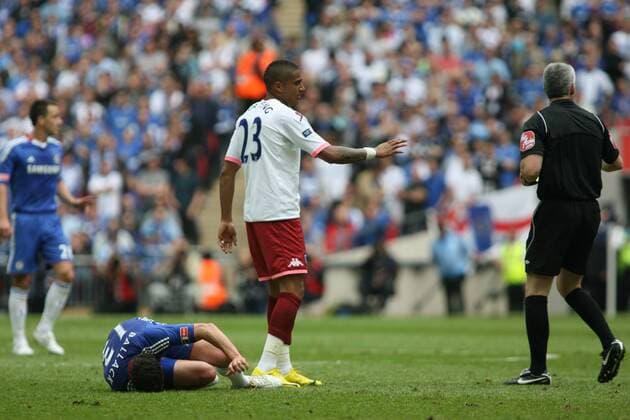 15 05 2010 FA Cup Final FC Chelsea (blue) v FC Portsmouth (white) at Wembley. Kevin Prince Boateng of Portsmouth tackles Chelsea s Michael Ballack and causes an injury to his ankle that means he will miss this years World Cup Finals in South Africa. x  ActionPlus11042343 o0 Foul