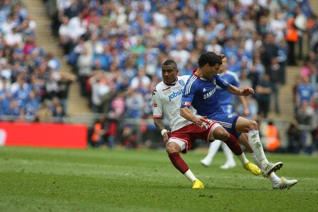 15 05 2010 FA Cup Final FC Chelsea (blue) v FC Portsmouth (white) at Wembley. Kevin Prince Boateng of Portsmouth tackles Chelsea s Michael Ballack and causes an injury to his ankle that means he will miss this years World Cup Finals in South Africa. x  ActionPlus11042359 o0 Foul