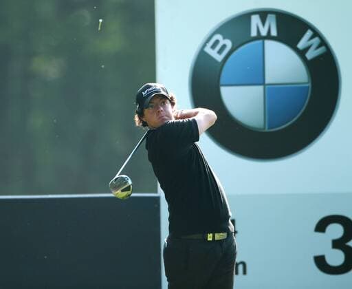 21 05 2010. Northern Ireland s Rory McIlroy blasts his tee shot at the 3rd hole during the second round. BMW PGA Championship at Wentworth Golf Club, Surrey, England xColinxReadx  ActionPlus11043962 o0 Nordirland Mc Ilroy Sponsor Wirtschaft
