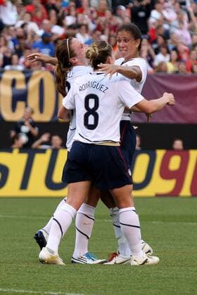 22 MAY 2010: USA team members (L-R) Kristine Lilly, Shannon Boxx and Amy Rodriguez (8) celebrate a Lily goal during the first half of their International Friendly match against Germany at Cleveland Browns Stadium in Cleveland Ohio May 22, 2010. Icon22762131 o0 Jubel, Freude, EDITORIAL USE ONLY