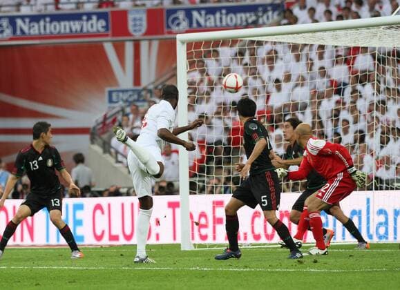 England s Ledley King (2.R) scoring his sides opening goal International Friendly - England vs Mexico - 24th May, 2010 EDITORIAL USE ONLY. No use with unauthorised audio, video, data, fixture lists, club league logos or live services. Online in-match use limited to 120 images, no video emulation. No use in betting, games or single club league player publications.