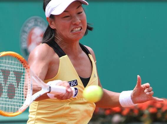 Kimiko Date Krumm of Japan hits a shot during her French Open first round match at Roland Garros in Paris on May 25, 2010.  PAR20100525713
