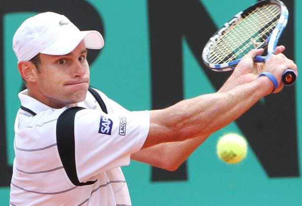 USA s Andy Roddick hits a shot during his French Open first round match at Roland Garros in Paris on May 25, 2010.  PAR20100525724 o0 Andrew