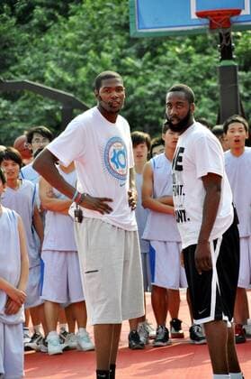 NBA player Kevin Durant, left, and his teammate James Harden of Oklahoma City are seen during a basketball training camp in Shanghai, China, 6 June 2010. Kevin Durant and James Harden heat up Shanghai basketball training camp  pau387977_13