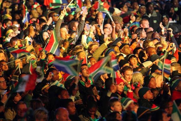 SOWETO, ? 10 June 2010: Thousands of excited soccer and music lovers attend the kick-off celebration concert at Orlando Stadium in Soweto, on 10 June 2010. Gallo117116 o0 Fan, Publikum totale