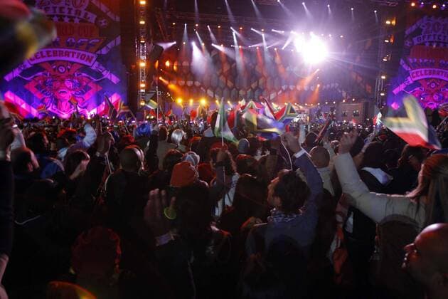 SOWETO, ? 10 June 2010: Thousands of excited soccer and music lovers attend the kick-off celebration concert at Orlando Stadium in Soweto, on 10 June 2010. Gallo117117 o0 Fan, Publikum totale