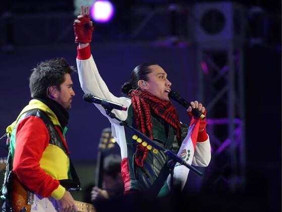 SOWETO, ? 10 June 2010: Juanes (COL, L) and Taboo (USA) from the Black Eyed Peas entertain the crowds at the kick-off celebration concert at Orlando Stadium in Soweto, on 10 June 2010. Gallo117119