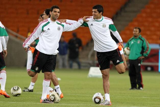 10 JUN 2010: Mexico s Rafael Marquez (left) stretches with fellow defender Francisco Rodriguez (right). Icon918100610010 EDITORIAL USE ONLY