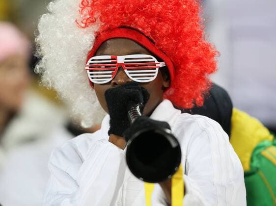An England fan enjoys playing the vuvuzela FIFA World Cup 2010 - 12th June, 2010 EDITORIAL USE ONLY. No use with unauthorised audio, video, data, fixture lists, club league logos or live services. Online in-match use limited to 120 images, no video emulation. No use in betting, games or single club league player publications.