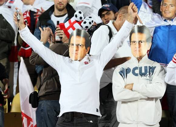 England s fans with Coach Fabio Capello masks FIFA World Cup 2010 - 12th June, 2010 EDITORIAL USE ONLY. No use with unauthorised audio, video, data, fixture lists, club league logos or live services. Online in-match use limited to 120 images, no video emulation. No use in betting, games or single club league player publications.