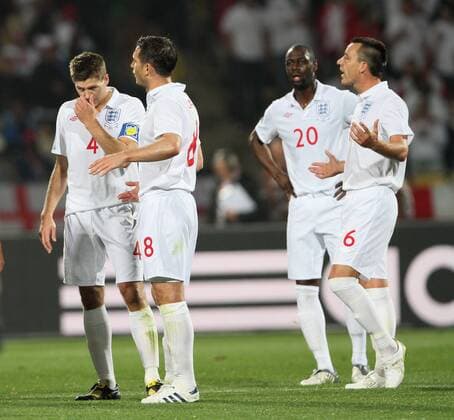 England s Steven Gerrard (L), Frank Lampard (2L) and John Terry (R) look on dejected after conceding the first goal FIFA World Cup 2010 Group C England v USA 12th June, 2010 EDITORIAL USE ONLY. No use with unauthorised audio, video, data, fixture lists, club league logos or live services. Online in-match use limited to 120 images, no video emulation. No use in betting, games or single club league player publications.