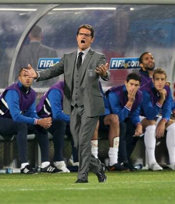 England s coach Fabio Capello looks on dejected FIFA World Cup 2010 Group C England v USA 12th June, 2010 EDITORIAL USE ONLY. No use with unauthorised audio, video, data, fixture lists, club league logos or live services. Online in-match use limited to 120 images, no video emulation. No use in betting, games or single club league player publications. o0 Nationaltrainer