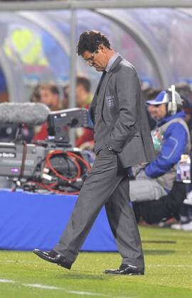 Fabio Capello coach of England reacts as England can only draw , FIFA World Cup 2010 Group C, England - USA 12th June, 2010 - EDITORIAL USE ONLY. No use with unauthorised audio, video, data, fixture lists, club league logos or live services. Online in-match use limited to 120 images, no video emulation. No use in betting, games or single club league player publications. o0 Nationaltrainer, Trainer