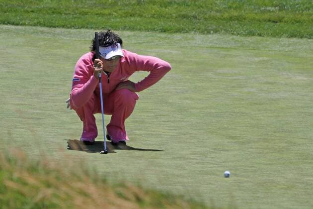 Ryo Ishikawa (JPN) lines up a shot on the 10th green in the first round of the U.S. Open in Pebble Beach, California on June 17, 2010.  PBP20100617205