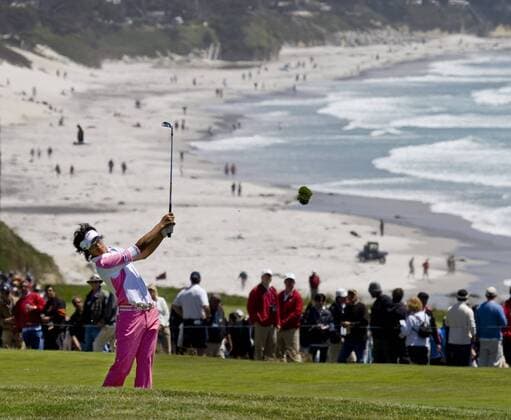 Ryo Ishikawa (JPN) of Japan makes his second shot on the 13th hole in the first round of the U.S. Open in Pebble Beach, California on June 17, 2010.  SXP2010061715 o0 Zuschauer Meer Strand