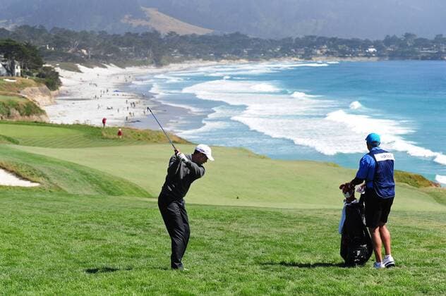 Tiger Woods (USA) takes a practice swing on the 9th fairway during the first round of the U.S. Open in Pebble Beach, California on June 17, 2010.  PBP20100617125 o0 Golfkurs Kurs Golfplatz Meer Strand