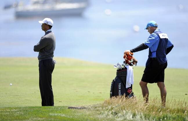 17 June 2010: Tiger Woods (USA) and his caddy Steve Williams (NZL) on the fifth fairway during the first round of play of the USGA 2010 U.S. Open Championship at Pebble Beach Golf Links, Pebble Beach, California. Icon12810061727 EDITORIAL USE ONLY
