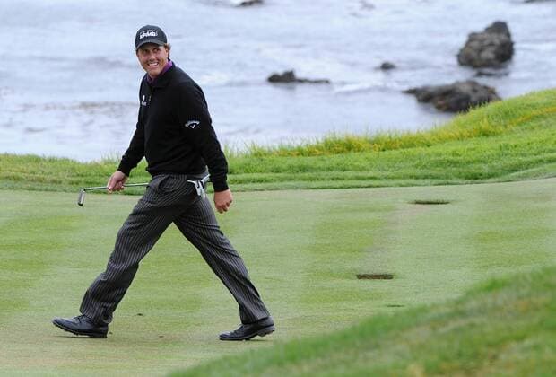 Phil Mickelson (USA) smiles as he walks down the 8th green during the second round of the U.S. Open in Pebble Beach, California on June 18, 2010.  PBP20100618326