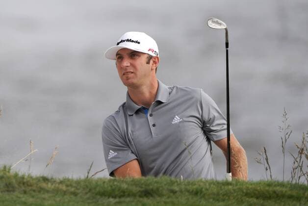 Dustin Johnson (USA) watches his chip on the 8th fairway during the third round of the U.S. Open in Pebble Beach, California on June 19, 2010.  PBP20100619307