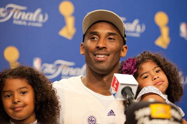 17 June 2010: Guard Kobe Bryant of the Los Angeles Lakers speaks to the media with his daughters Gianna and Natalia after the Lakers defeat the Boston Celtics 83-79 and win the NBA championship in Game 7 of the NBA Finals at the STAPLES Center in Los Angeles, CA. Icon1811006170064 EDITORIAL USE ONLY