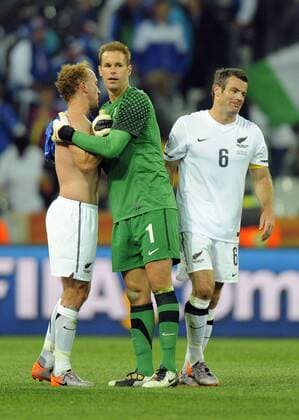 Simon Elliott of New Zealand (L) and Ryan Nelsen of New Zealand (R) congratulates Goalkeeper Mark Paston of New Zealand FIFA World Cup 2010 Group F Italy (ITA blue) vs New Zealand (NZL white) 20th June, 2010 EDITORIAL USE ONLY. No use with unauthorised audio, video, data, fixture lists, club league logos or live services. Online in-match use limited to 120 images, no video emulation. No use in betting, games or single club league player publications. o0 Jubel Freude