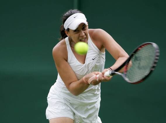 TENNIS - WTA, Wimbledon 2010 LONDON,ENGLAND,21.JUN.10 - TENNIS - WTA, Wimbledon 2010, Grand Slam. Bild zeigt Marion Bartoli (FRA). 