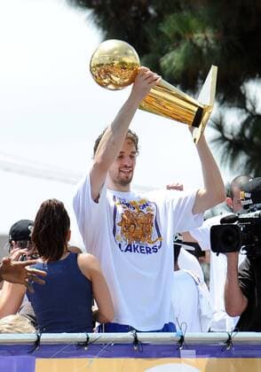 21 June 2010: Pau Gasol holds up the trophy during the Los Angeles Lakers victory parade through the streets of Los Angeles after defeating the Boston Celtics in seven games to win the NBA Championship. Los Angeles, CA. Icon007106211936 EDITORIAL USE ONLY