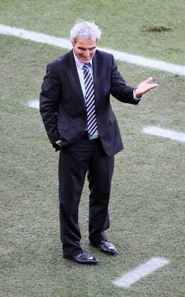 France s coach Raymond Domenech looks on dejected FIFA World Cup 2010 Group A France (FRA blue) vs South Africa (RSA yellow) 22nd June, 2010 EDITORIAL USE ONLY. No use with unauthorised audio, video, data, fixture lists, club league logos or live services. Online in-match use limited to 120 images, no video emulation. No use in betting, games or single club league player publications. o0 Nationaltrainer Freisteller