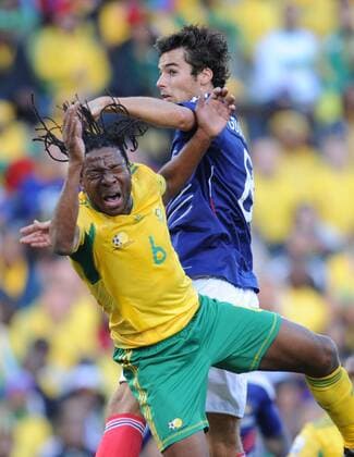 France s Yoann Gourcuff (R) collides with South Africa s midfielder Macbeth Sibaya leading to a red card for Gourcuff during a Group A match between France and South Africa at the 2010 World Cup football match in Bloemfontein - 