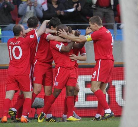 (100623) -- PORT ELIZABETH, June 23, 2010 () -- England s Jermain Defoe (4th L) celebrates his scoring with teammates during the 2010 World Cup Group C soccer match against Slovenia at Nelson Mandela Bay stadium in Port Elizabeth, June 23, 2010. - 