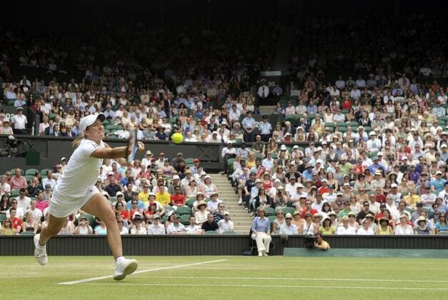 Tennis : Tournoi de Wimbledon - 25.06.2010 - Justine Henin (BEL) - xPhotoNewsx  o0 totale