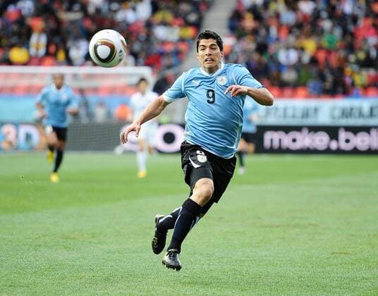 Luis Suarez of Uruguay in action at the Nelson Mandela Bay Stadium, Port Elizabeth 