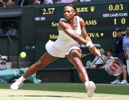 Serena Williams of USA plays a backhand in her match on the seventh day of the Wimbledon championships in Wimbledon on June 28, 2010.  LON2010062809