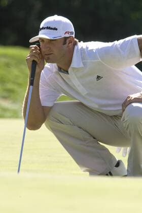 Dustin Johnson checks the green as he prepares to putt on hole 13 during first round play of the AT&T National at Aronimink Golf Club in Newtown Square, Pennsylvania on July 1, 2010. He finished with a one over par 71 for the day.  PHI2010070107