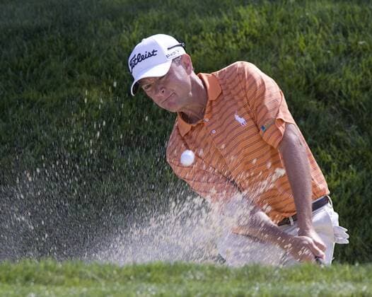 Davis Love III blasts out of a sand trap on hole 13 during first round play of the AT&T National at Aronimink Golf Club in Newtown Square, Pennsylvania on July 1, 2010. Love, who was playing with Tiger Woods today finished with a 9 over par 79.  PHI2010070108