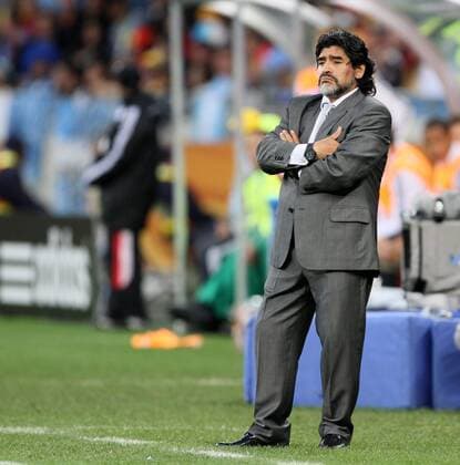 Argentina s coach Diego Armando Maradona looks on dejected FIFA World Cup 2010 QuarterFinals Argentina v Germany 3rd July, 2010 EDITORIAL USE ONLY. No use with unauthorised audio, video, data, fixture lists, club league logos or live services. Online in-match use limited to 120 images, no video emulation. No use in betting, games or single club league player publications.