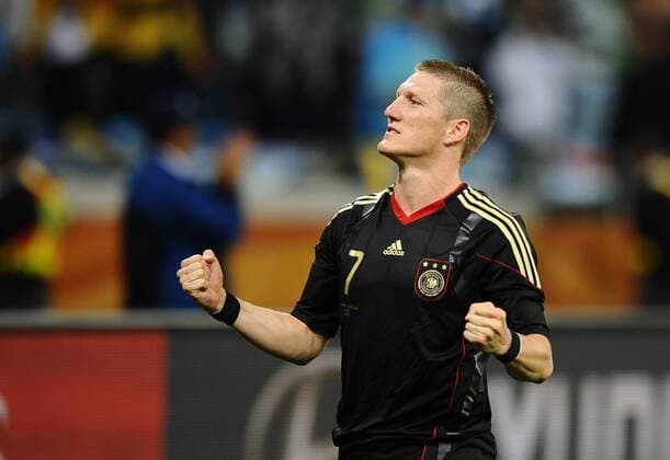 Football - 2010 FIFA World Cup - QuarterFinal - Argentina vs. Germany Bastian Schweinsteiger of Germany celebrates following his teams win and progression through to the at Green Point Stadium, Cape Town 