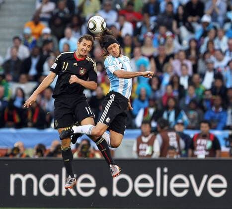 Martin Demichelis from Argentina (R) and Miroslav Klose from Germany during the quarterfinal on July 3, 2010 at the Cape Town Stadium Gallo0000119330 o0 Werbebande, Bande, Werbung Schriftzug Werbebande Sony Kampagne make belief Werbung Sponsor