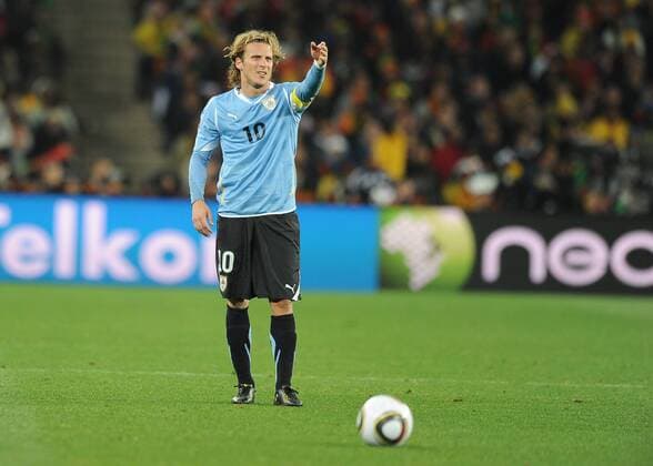 2 July 2010: Uruguay forward Diego Forlan (10) prepares to take a free kick during the game between Ghana and Uruguay at Soccer City in the FIFA World Cup 2010. Icon010100702141 EDITORIAL USE ONLY