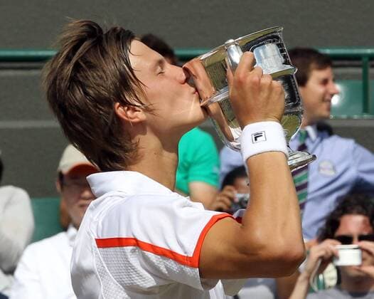 Tennis - The Wimbledon Championships - Junior Final - Marton Fucsovics ( HUN ) with the Trophy at the All England Lawn Tennis and Croquet Club 