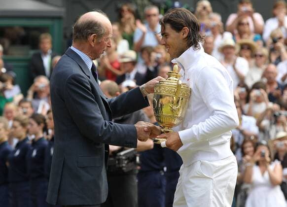 Tennis - The Wimbledon Championships - Mens Final - Duke of Kent (GBR, L) gives Rafael Nadal ( ESP ) the Trophy at the All England Lawn Tennis and Croquet Club 