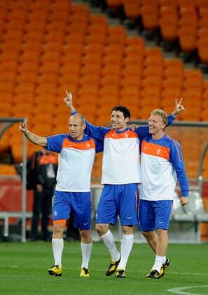 July 10, 2010 - Johannesburg - Arjen Robben, Mark Van Bommel and Dirk Kuyt (L-R) of the Netherlands celebrate during an official training session at Soccer City stadium in Soweto, suburban Johannesburg, on July 10, 2010. - ZUMAgh1 o0 Freude