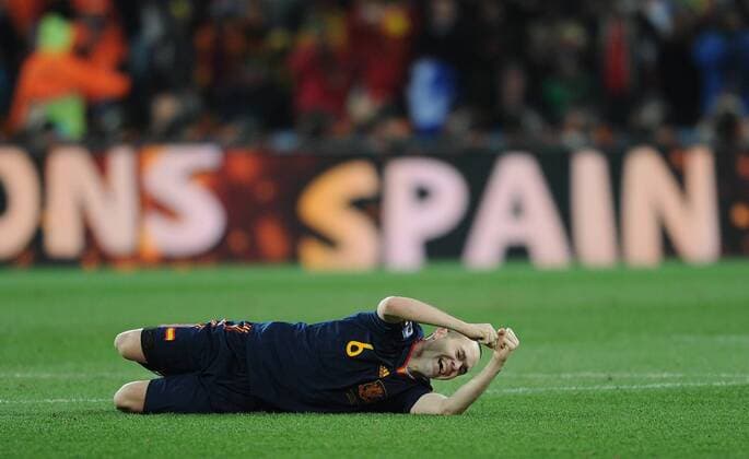 JOHANNESBURG, July 11, 2010 -- Andres Iniesta of Spain celebrates after the World Cup final against the Netherlands at Soccer City stadium in Johannesburg, July 11, 2010. Spain won the match 1-0. ---  o0 Einzelbild Jubel Freude Emotionen Bande Schriftzug