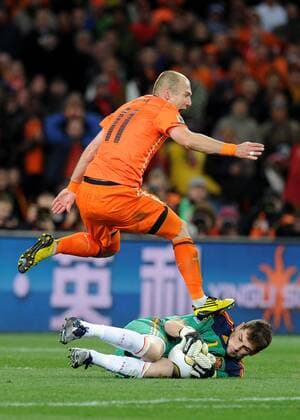 July 11, 2010 - Johannesburg, - Arjen Robben l. of Netherlands fights for the ball with Iker Casillas of Spain during the 2010 FIFA World Cup Final soccer match between Netherlands and Spain at Soccer City Stadium on July 11, 2010 in Johannesburg, . - ZUMAgh1